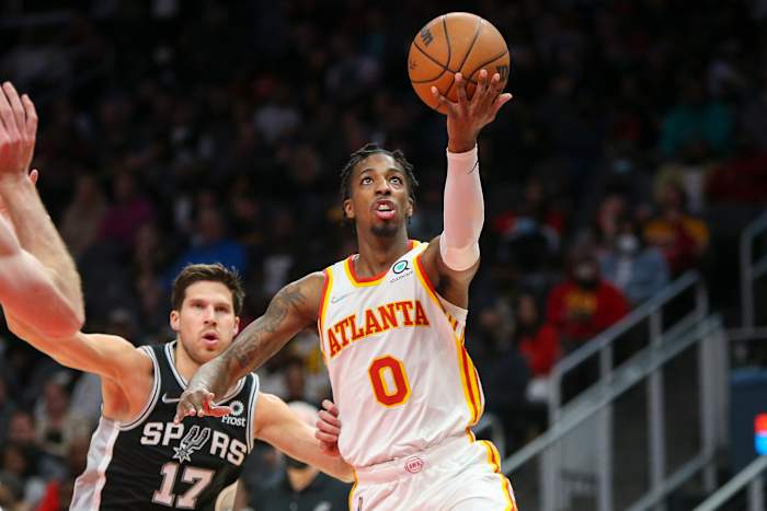 Feb 11, 2022; Atlanta, Georgia, USA; Atlanta Hawks guard Delon Wright (0) shoots against the San Antonio Spurs in the second half at State Farm Arena.